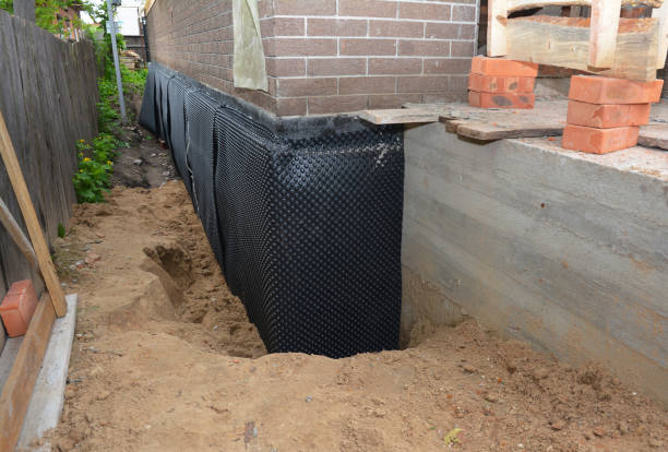 Happy homeowners after waterproofing job in Barnesville